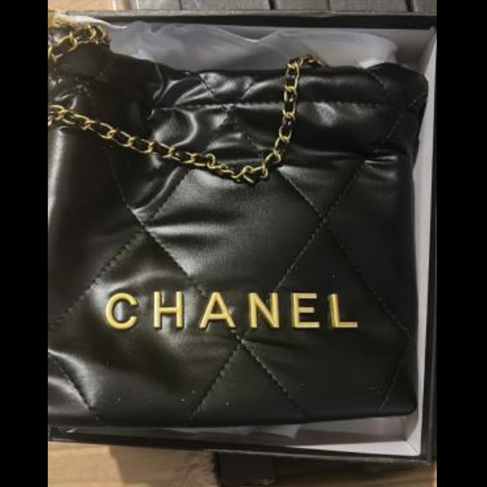 Black Quilted Leather Bag with Gold Accents